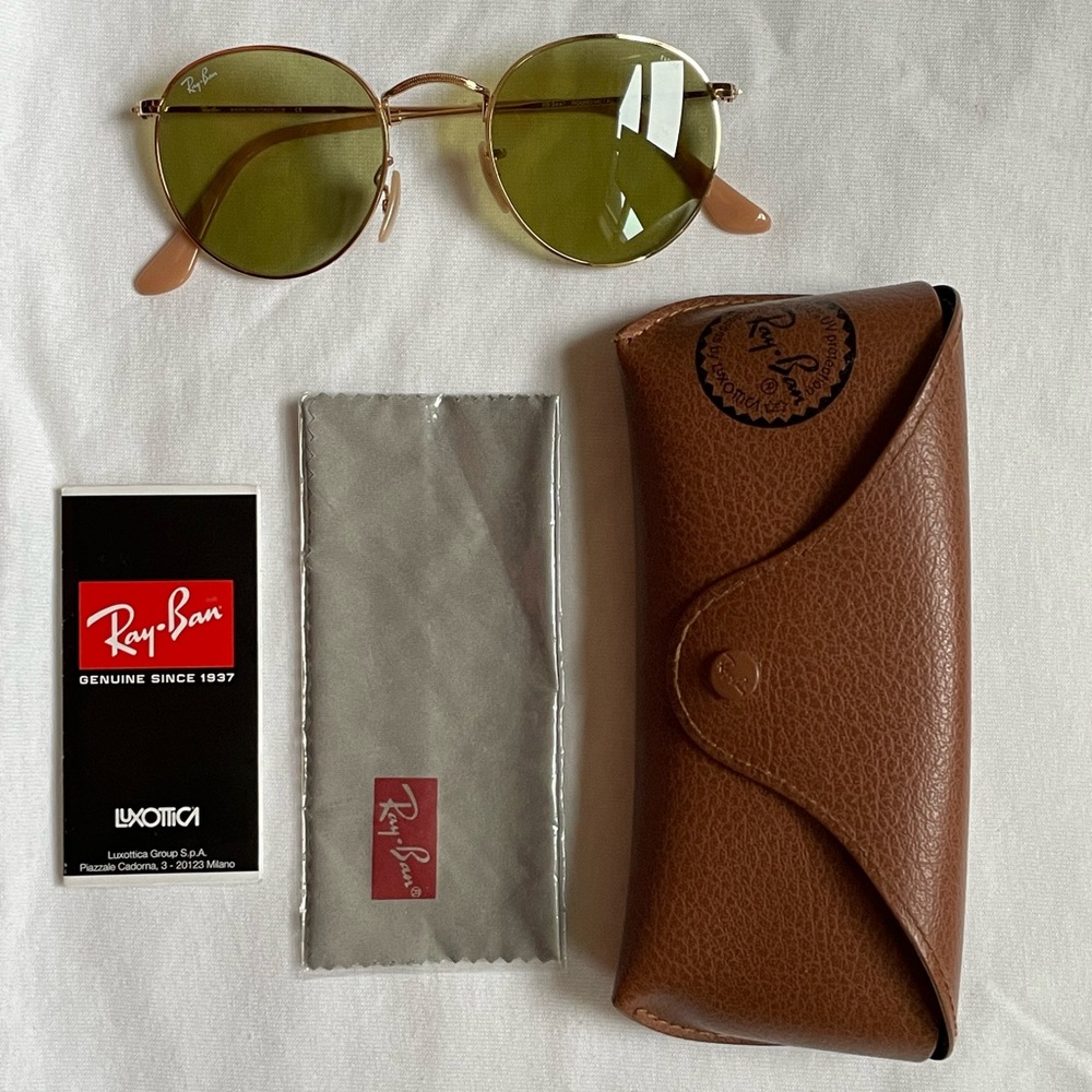 Ray-Ban circle sunglasses with case and cleaner.